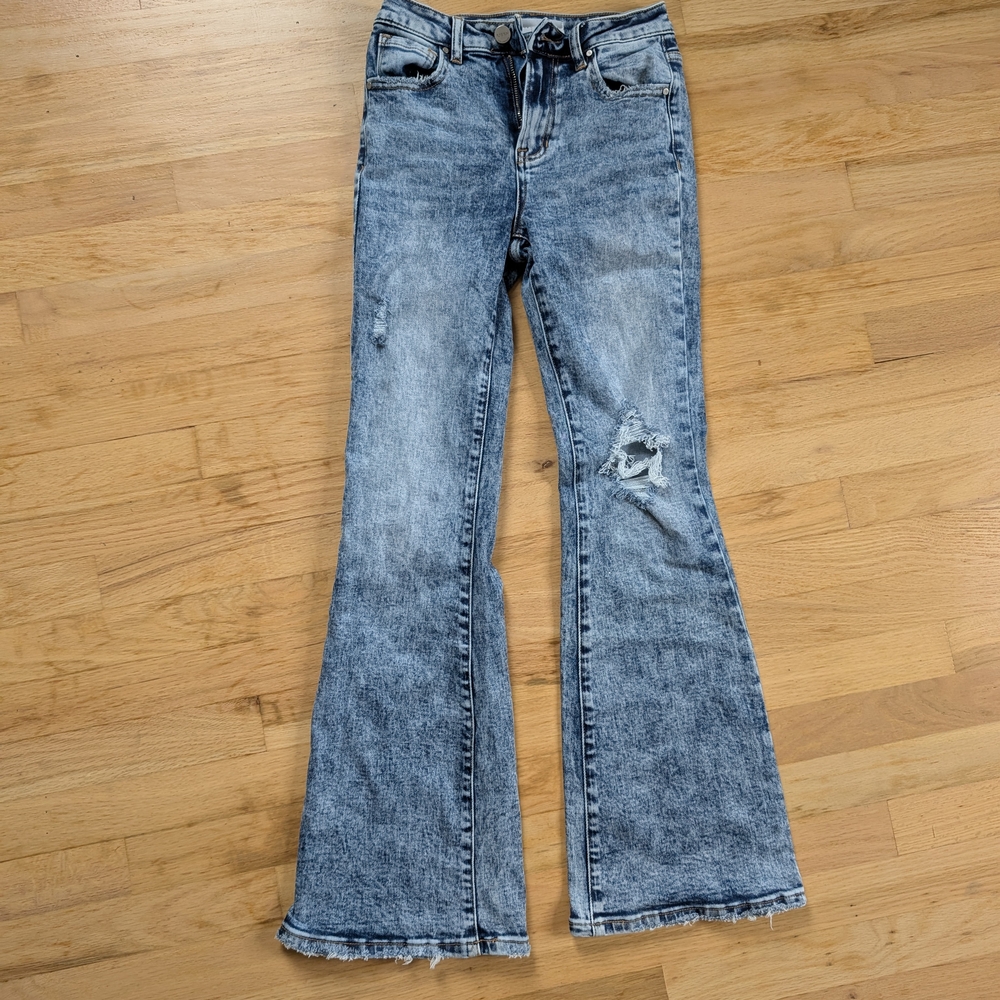 Women's Distressed Blue Jeans